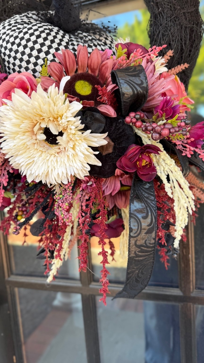 Close up of florals on Moody Bohemian Harlequin Pumpkin Wreath by Wisp and Wonder Designs.