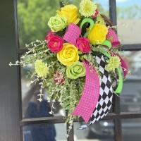 Bright pink and lime green harlequin mini wreath with yellow roses and greenery