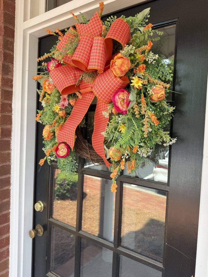 Side angle showing depth, dimension, and fullness of wreath.